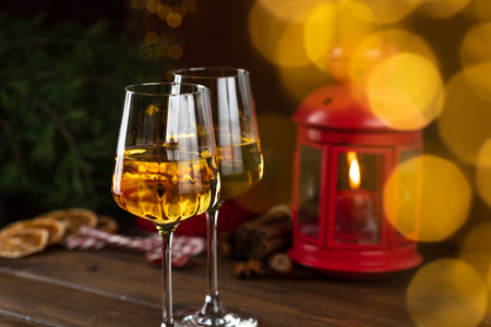 White wine in glasses on a wooden tableの写真素材