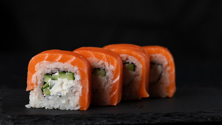 Sushi and rolls cooked on the tableの写真素材