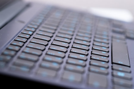 macro photo of laptop keyboard, keys with letters closeの写真素材