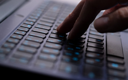 macro photo of laptop keyboard, keys with letters closeの写真素材