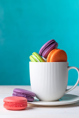 Colorful macaroni cookies with crumbsの写真素材