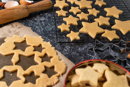 Cutting cookies in the shape of stars from the dough.の写真素材
