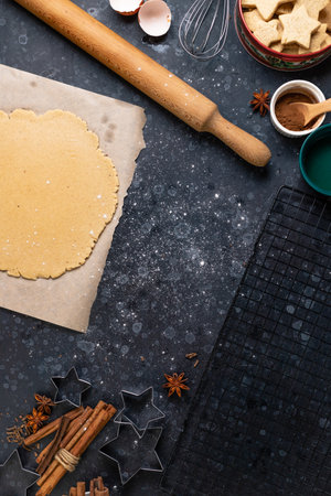 Cutting cookies in the shape of stars from the dough.の写真素材
