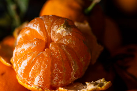 Tangerines in a plate on a wooden tableの写真素材
