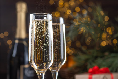 two glasses of champagne on the New Year's tableの写真素材