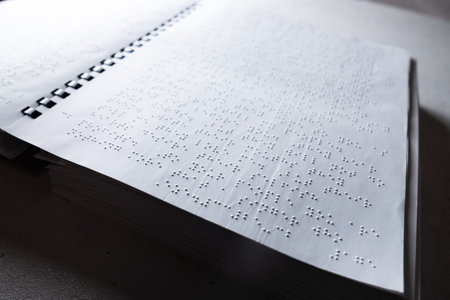Reading a book in Brailleの写真素材