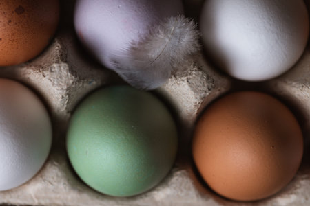 Colorful eggs on a wooden table