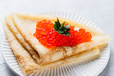 Pancakes with red caviar fillingの写真素材