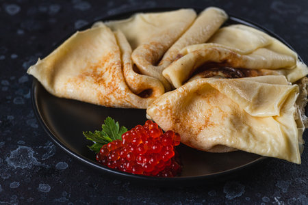 Pancakes with red caviar fillingの写真素材