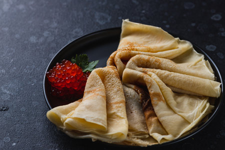 Pancakes with red caviar fillingの写真素材