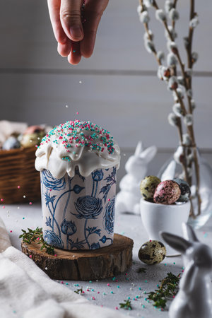 Easter cake with icing and sprinklesの写真素材