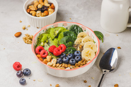 Smoothie bowl with granola and berriesの写真素材