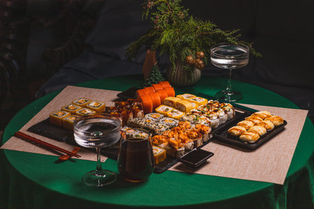 A set of sushi and rolls on the festive tableの写真素材