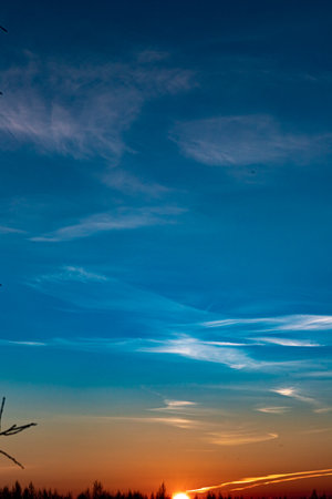 Dawn skies, pink clouds, delicate colors, bright skyの写真素材