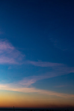 Dawn skies, pink clouds, delicate colors, bright skyの写真素材