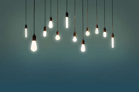 bulbs electric and a light as a concept background color blue, greenの写真素材