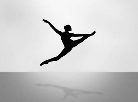 Ballet dancer in silhouette dancingの写真素材
