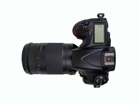 Digital camera with tele lens, professional isolated on whiteの写真素材
