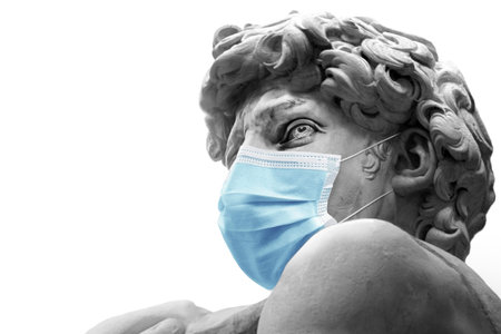 David by Michelangelo With a medical mask isolated, Renaissance sculpture created in marble