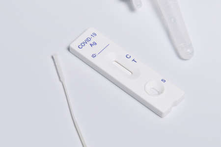 COVID-19 virus disease healthcare check, Coronavirus global pandemic outbreak crisis, Rapid Strep Test RST kit, Quick Antigen Detection Testing RADT, NHS patient fast antibody specimen serology analysisの写真素材