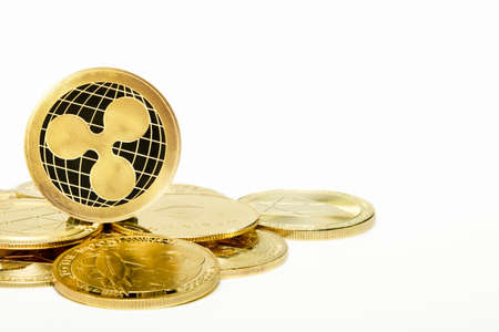 Ripple golden coin (XRP) Cryptocurrency. Ripple is a blockchain technology that acts as both a crypto currency and a digital payment network for financial transactionsの写真素材