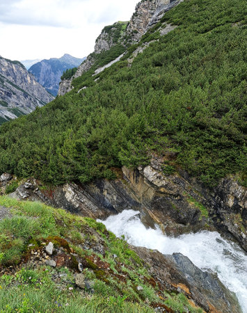 Water flowing through the mountains, beautiful nature backgroundの写真素材