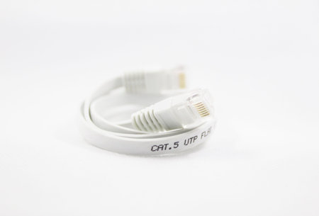 a LAN cable (network cable internet) manifold flat cable with a white background.の写真素材
