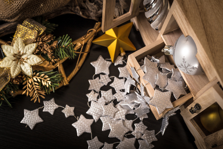 old wooden box with various Christmas decorationsの写真素材