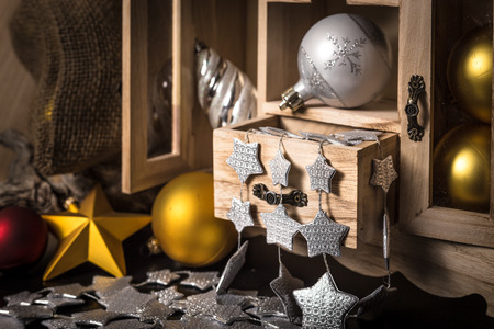 old wooden box with various Christmas decorationsの写真素材
