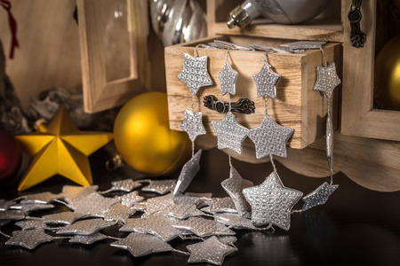 old wooden box with various Christmas decorationsの写真素材