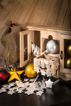 old wooden box with various Christmas decorationsの写真素材