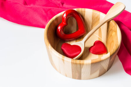 Valentine heart on wooden bowl. Heart soup. Enter your text.の写真素材