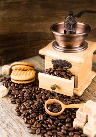 coffee beans with grinder and cane sugarの写真素材