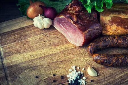 collage of different kinds of meat, smoked sausage and meatの写真素材