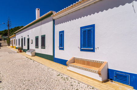 Portugal typical architecture with differnt colored windows in Algarveの写真素材