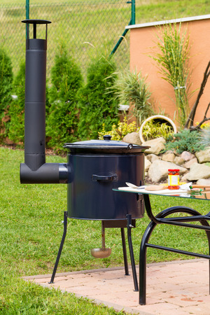 garden kettle for cooking goulash with chimneyの写真素材