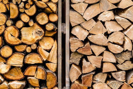 pile of stacked firewood in rural areasの写真素材