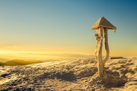 Tourist sign in the winter morning sun raysの写真素材