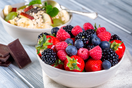 Bowl of berries. Blackberries; raspberries; blueberries on a bowl. Healthy breakfast. Vegetarian organic meal.の写真素材