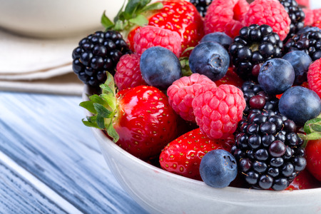 Bowl of berries. Blackberries; raspberries; blueberries on a bowl. Healthy breakfast. Selective focus.の写真素材