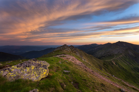 Landscape view on the Slovak mountain Nizke Tatry. Sunrise with dramatic sky.の写真素材