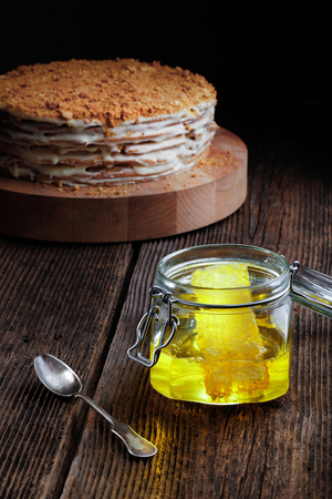 Homemade honey cake according to the traditional recipe on the wooden background.の写真素材