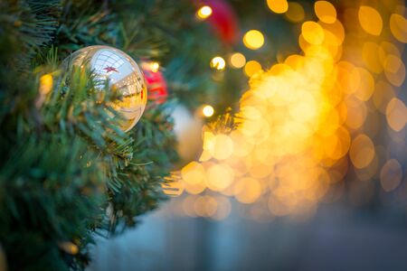 Christmas decoration on the synthetic garland with different colours and shapes.の写真素材