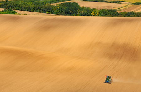 Tractor prepare field for a next season. Niederosterreich.の写真素材