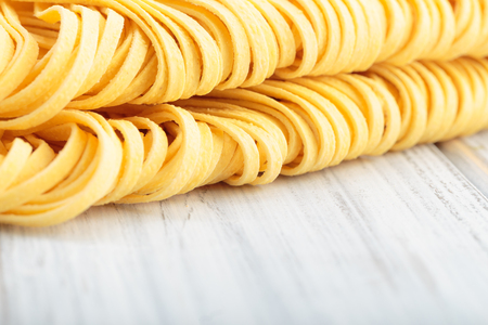 Fresh homemade Italian pasta on a tableの写真素材