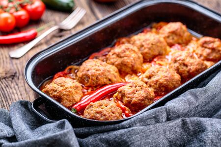 Homemade meatballs with sauce. Minced meat and vegetables.の写真素材