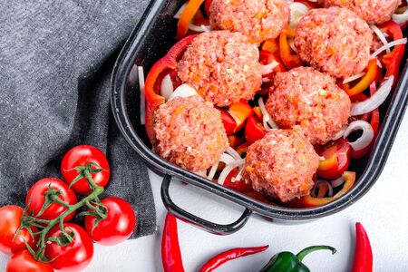 Homemade meatballs with sauce. Minced meat and vegetables.の写真素材