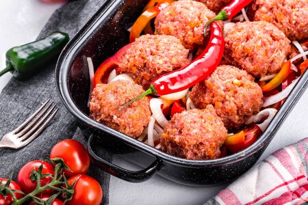 Homemade meatballs with sauce. Minced meat and vegetables.の写真素材