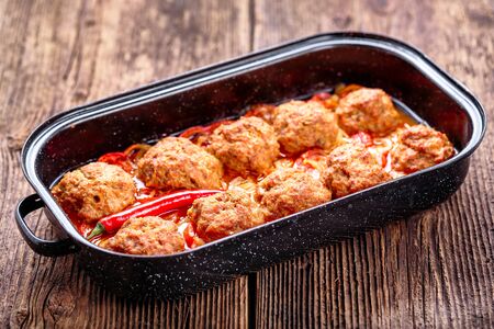 Homemade meatballs with sauce. Minced meat and vegetables.の写真素材