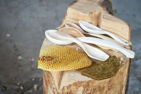 Treatment of wooden hand carved spoons using beeswaxの写真素材